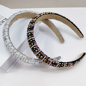 Detail of rhinestone and pearl sponge headbands with soft khaki suede lining