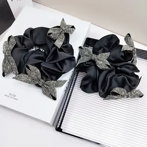 Elegant black satin scrunchie with sparkling rhinestone butterfly charms for women