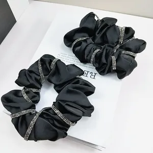 Elegant black satin scrunchies set with sparkling silver rhinestones for women hair
