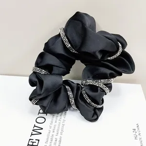 Elegant black satin scrunchie with sparkling rhinestone butterfly design for women