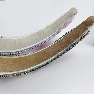 Detail of hand-sewn bead embroidery and soft velvet lining on fashion headbands