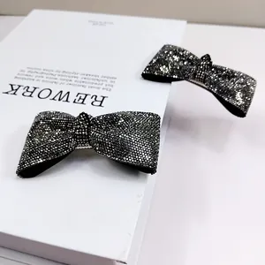 Lussuose forcine per capelli a fiocco nero con strass argentati, set da due pezzi chic