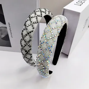 Close-up detail of luxury padded headbands with sparkling rhinestones and pearl base
