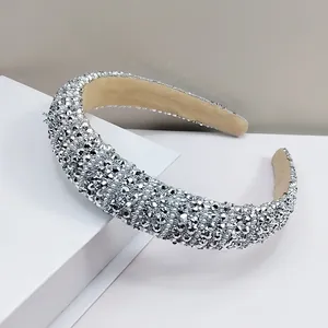 Luxury sponge padded headband with glittering silver rhinestones and beige lining