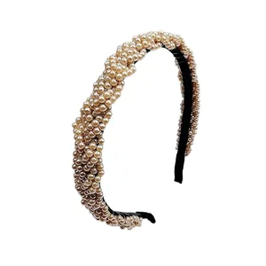 Elegant champagne pearl braided headband with black fabric base for party and wedding look