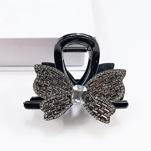 Pince à Cheveux Élégante en Forme de Papillon avec Strass pour Femme Résine Noire Grande Pince en Cristal Accessoires pour Fête Quotidienne