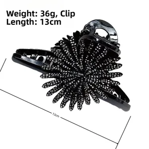 Macro shot of 13cm black sunflower hair claw clip with silver rhinestones weighing 36g