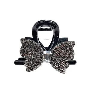 Pince à cheveux papillon noire élégante avec strass brillants pour coiffure féminine