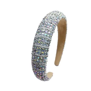 Luxe wide padded headband with iridescent AB rhinestones on a white background