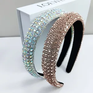Elegant padded headband set with shimmering crystals for a high crown voluminous hairstyle