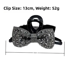 Detailed dimensions of 13cm sparkling bow claw clip with rhinestones weighing 52g