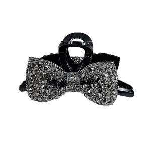 Sparkling black bow hair claw clip with charcoal rhinestones for women hair styling