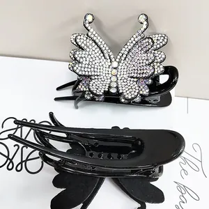 Elegante molletta per capelli a farfalla con strass colorati in finitura nera