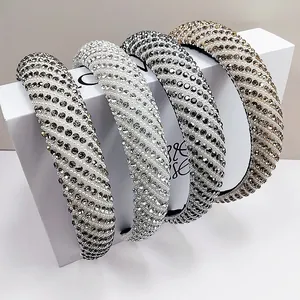 Detail of luxury padded headbands with sparkling rhinestones and elegant pearls