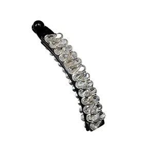 Pince à cheveux banane élégante avec strass brillants sur base noire brillante