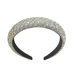 Luxurious wide headband featuring shimmering AB rainbow rhinestones on a vintage style frame