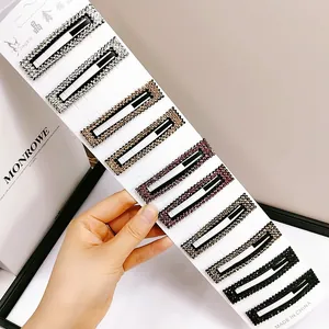Detailaufnahme von 10er Set Strass Haarklammern mit bunten rechteckigen Kristall-Designs