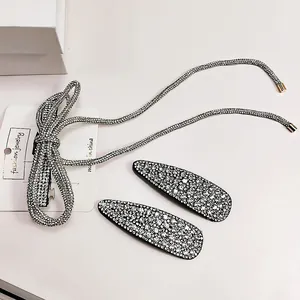 Set de accesorios para el cabello con lazo de diamantes de imitación y pinzas plata