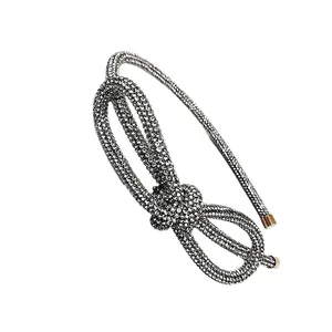 Diadema brillante de pedrería plateada con nudo de lujo y cristales para el cabello