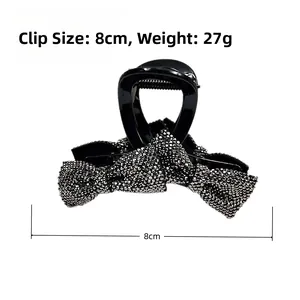 Detail view of 8cm rhinestone bow hair claw clip with specific dimensions and weight
