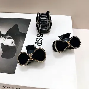 Elegante set de pinzas para el cabello en terciopelo negro con diamantes y lazos