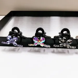 Pinces à cheveux papillon en cristal élégantes en violet, iridescent et noir pour femmes