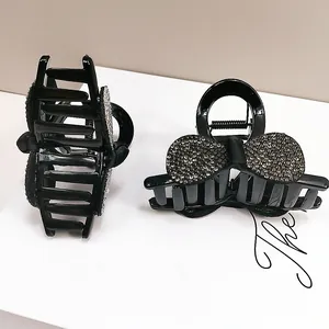 Elegante schwarze Haarklammern mit glitzernden Strass-Schleifen-Details für Damen