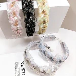 Floral braided headbands with crystal beads set in pink black yellow blue and purple colors