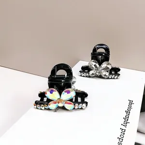 Barrettes à cheveux papillon élégantes avec strass et base noire pour femmes