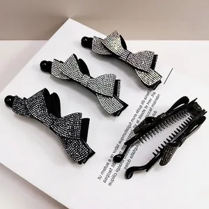 Lot de 4 barrettes banane à nœud en strass brillants pour une coiffure élégante