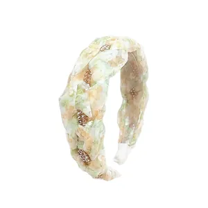Green floral braided headband with sparkling champagne crystal beads and embroidery