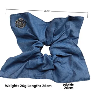 Blue denim scrunchie with diamond flower detail, measures 26cm and weighs 20g
