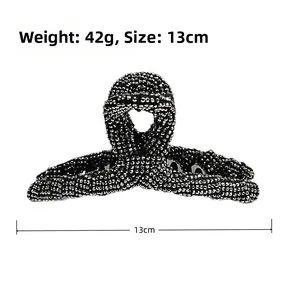 Detail view of 13cm black claw clip with full rhinestones highlighting size and 42g weight