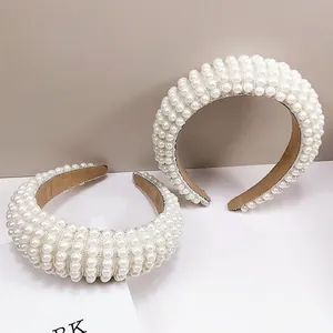 Elegant wide sponge headband with white pearls and crystals for a baroque bridal style