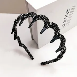 Sparkling wave headband with silver rhinestones and long inner teeth for non-slip grip