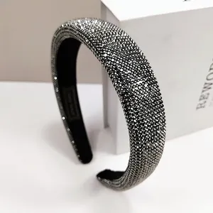 Detail of silver sparkling crystal beaded headband with thick padded non-slip design