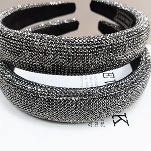 Macro view of handmade sparkling rhinestones on luxury padded headbands for women