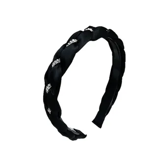 Cerchietto in raso nero intrecciato con cristalli scintillanti e denti antiscivolo