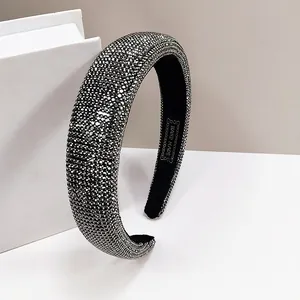 Chic rhinestone padded headband with sparkling crystal beads and handmade interior label