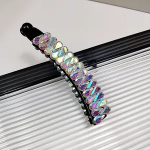 Pince à cheveux banane noire avec strass colorés pour une coiffure élégante