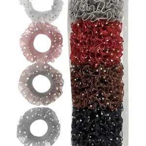Polka dot organza scrunchies set with ruffled edges in assorted neutral colors