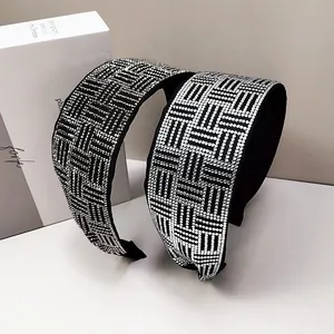 Detail showing high-quality silver rhinestones on two black woven wide headbands