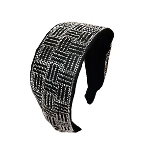 Sparkling rhinestone headband with silver crystal weave pattern on black fabric base