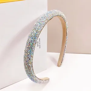 Macro shot of luxury padded headband featuring colorful AB rhinestones and soft inner lining