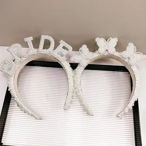 Elegant white pearl BRIDE and butterfly headband set for weddings and parties