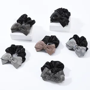 Sparkling rhinestone bow scrunchies set in six elegant colors for bun and hair styling