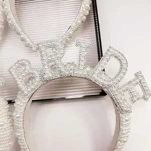 Detail of BRIDE headband with pearls and rhinestones for bridal parties and weddings