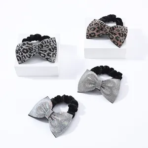 Set di elastici per capelli con fiocchi di strass brillanti e motivi leopardati