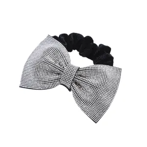 Elastico per capelli in velluto nero con fiocco di strass scintillanti per acconciature