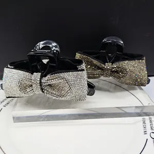 Elegante Haarklammern mit Strasssteinen in Schleifenform in Silber und Goldfarben